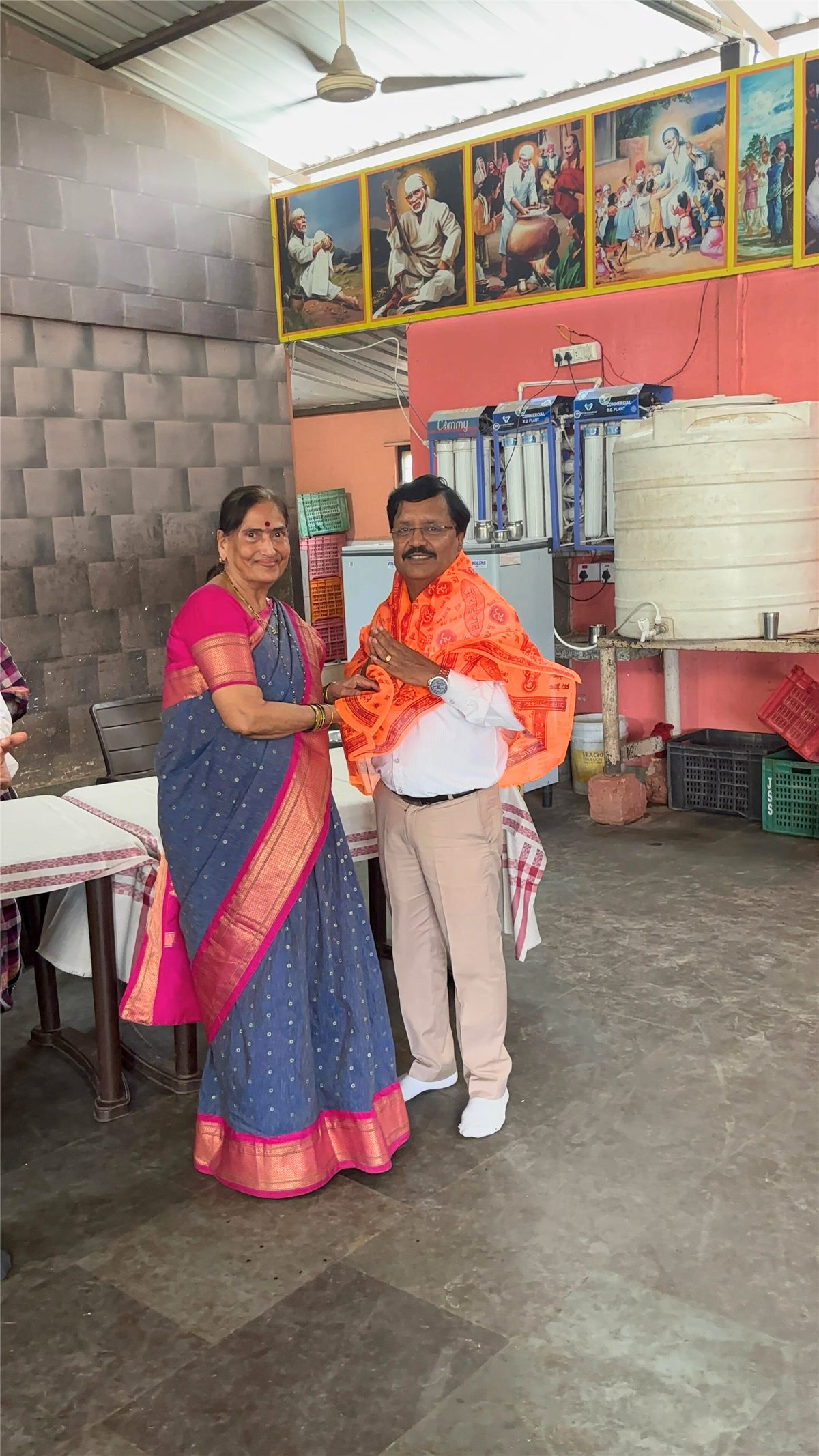 Dr. Shrimali being felicitated at the Shirdi camp